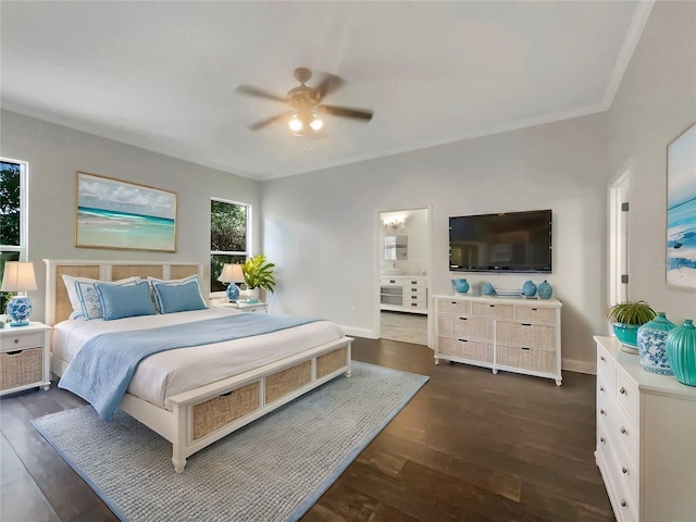 bedroom featuring a ceiling fan, ensuite bathroom, dark wood-type flooring, and baseboards