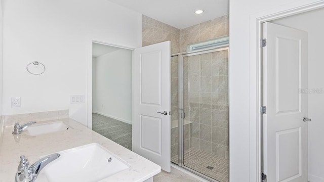 bathroom with vanity and walk in shower