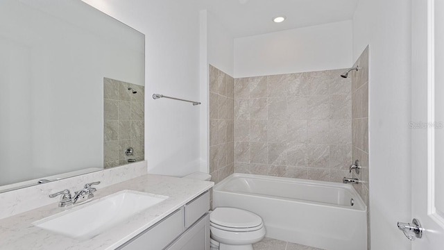 full bathroom with vanity, toilet, and tiled shower / bath combo