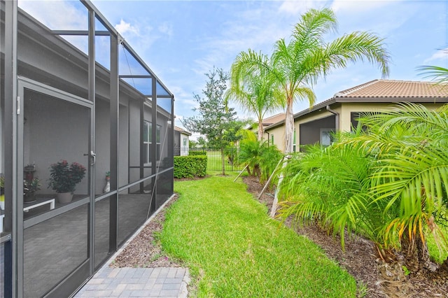 view of yard featuring a lanai