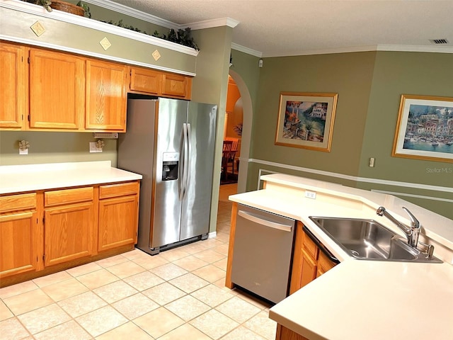 kitchen with sink, crown molding, stainless steel appliances, and light tile patterned flooring