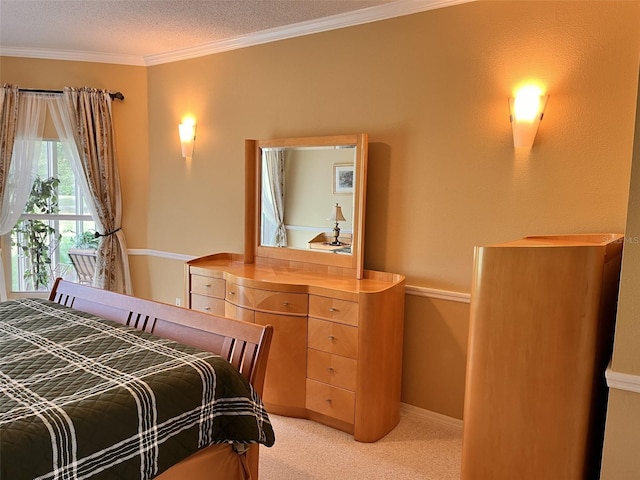 bedroom with light colored carpet, a textured ceiling, and crown molding