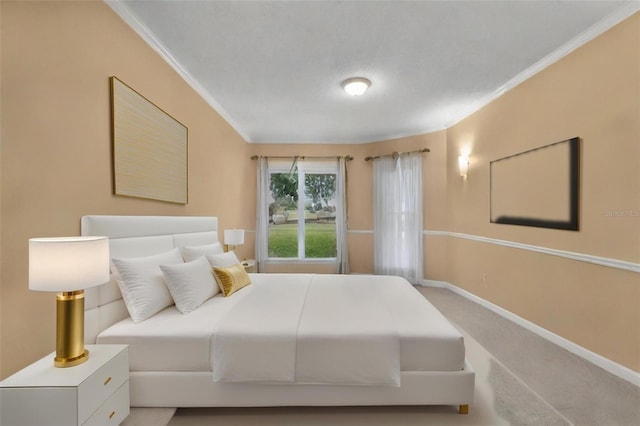 carpeted bedroom featuring ornamental molding and baseboards