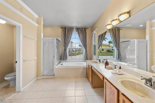 bathroom with a sink, a bath, and a shower stall