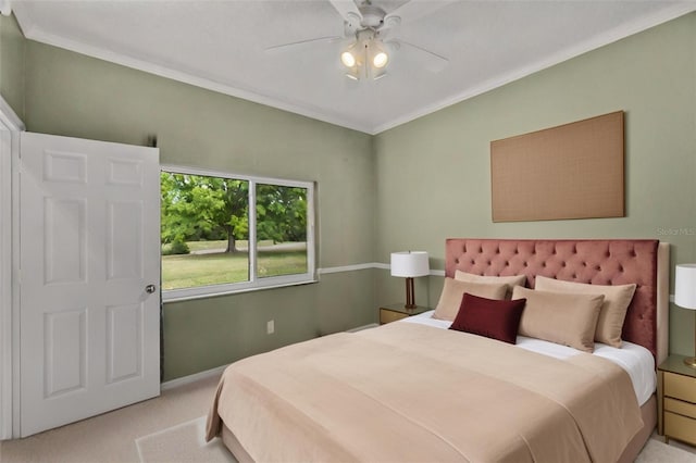 bedroom with light carpet, baseboards, ornamental molding, and ceiling fan