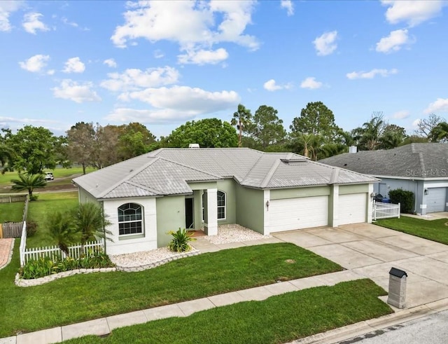 13102 Prestwick Dr, Riverview, FL 33579 - ranch-style home featuring a garage, stucco siding, a tile roof, and driveway