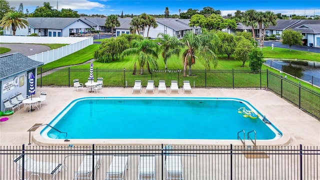 view of swimming pool featuring a patio area