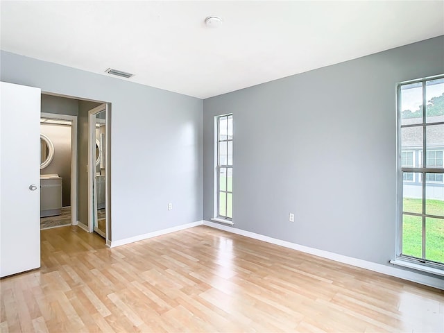 interior space with light hardwood / wood-style flooring and plenty of natural light