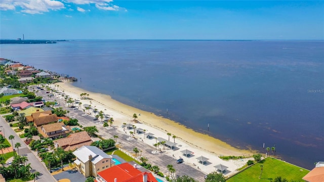 bird's eye view with a view of the beach and a water view