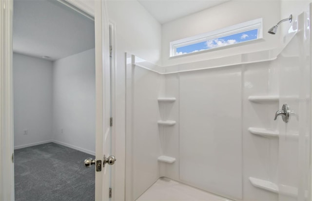 bathroom featuring walk in shower