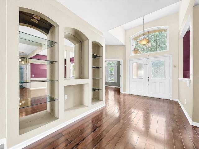 entrance foyer with french doors and wood-type flooring