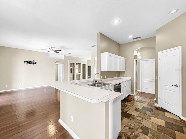 kitchen with ceiling fan, dark hardwood / wood-style flooring, sink, and white cabinetry