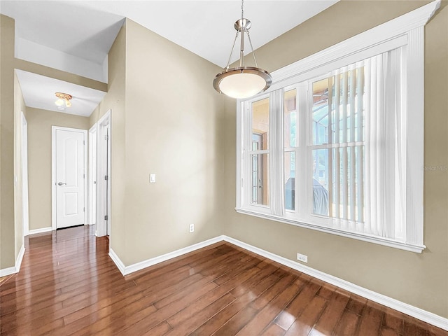 empty room featuring hardwood / wood-style floors