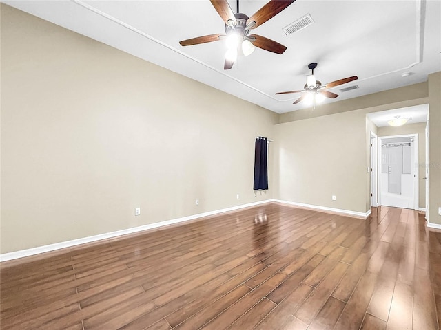 unfurnished room featuring ceiling fan and wood-type flooring