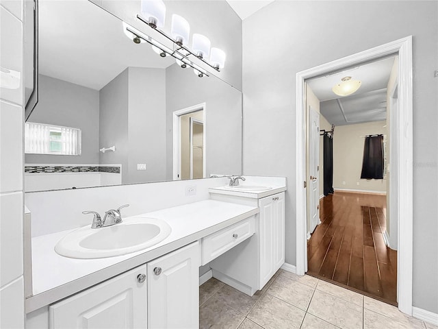 bathroom with vanity and tile patterned floors