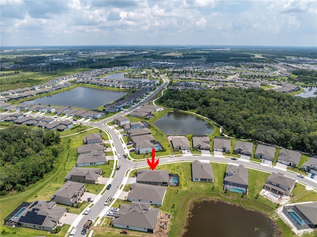 aerial view featuring a residential view and a water view