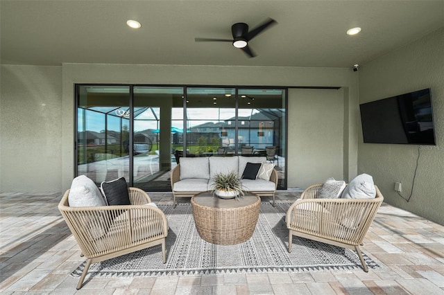 view of patio / terrace with a ceiling fan and an outdoor hangout area