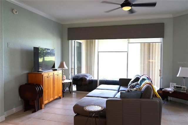 tiled living room with ornamental molding, a wealth of natural light, and ceiling fan