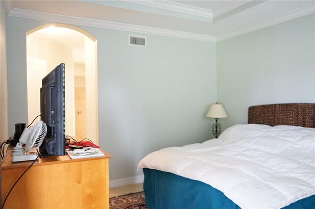 bedroom featuring ornamental molding