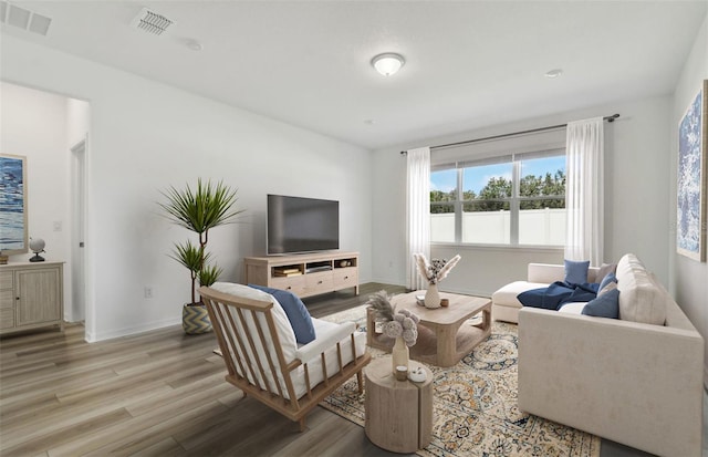 living room with light hardwood / wood-style floors