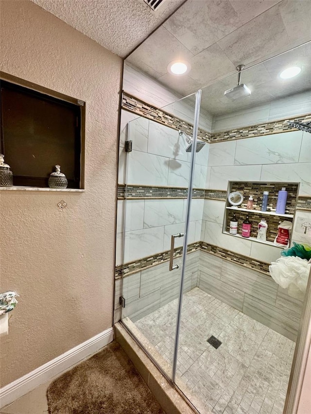 bathroom with an enclosed shower