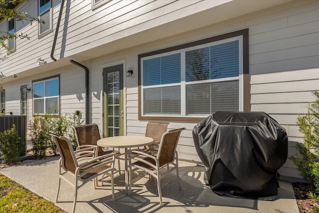 view of patio featuring area for grilling and central AC