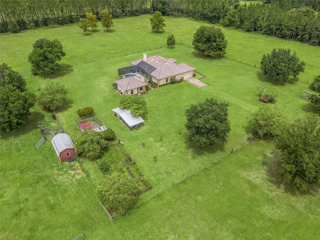 birds eye view of property with a rural view