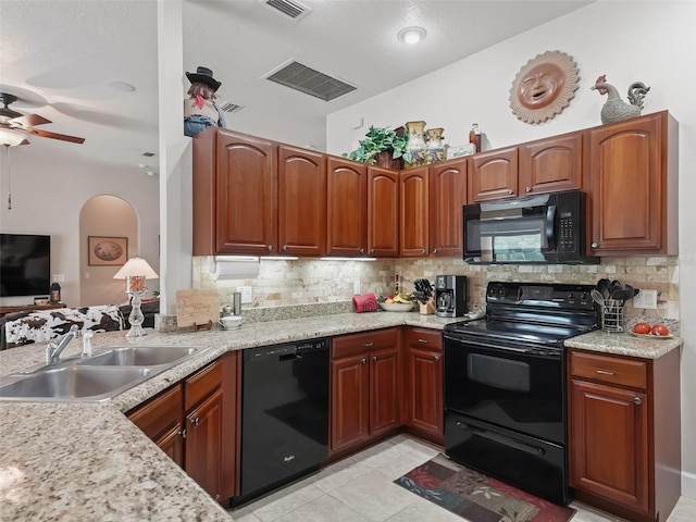 kitchen featuring ceiling fan, backsplash, sink, black appliances, and light tile patterned flooring