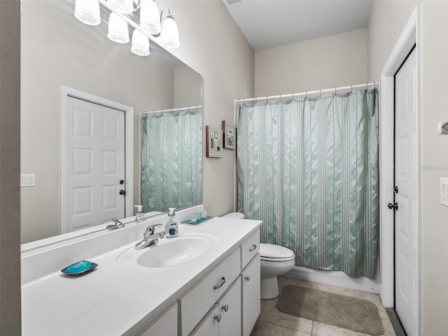 full bathroom featuring toilet, shower / bath combo, tile patterned flooring, and vanity