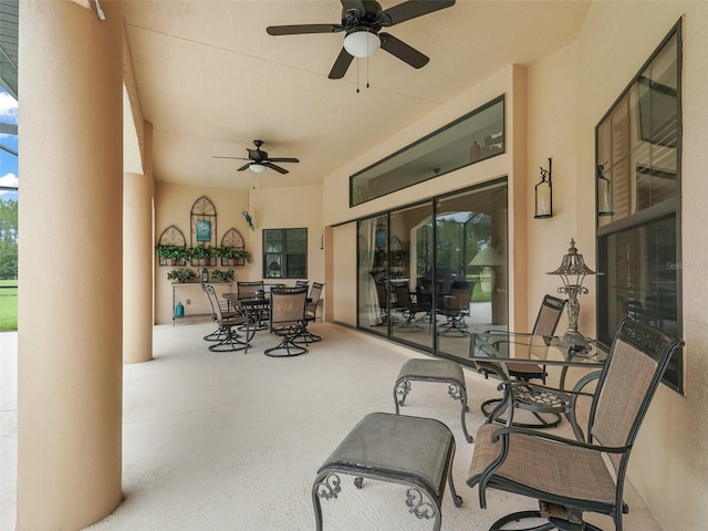 view of patio featuring ceiling fan