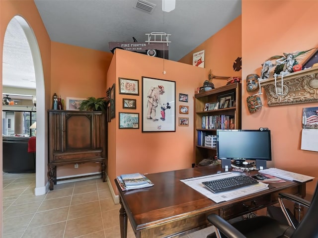 office area with light tile patterned floors