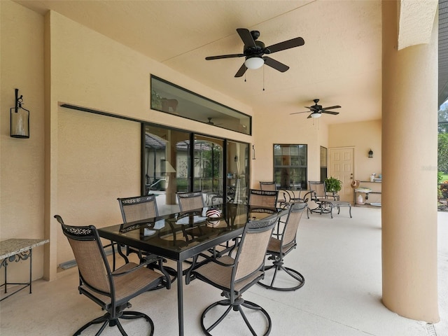 view of patio / terrace featuring ceiling fan