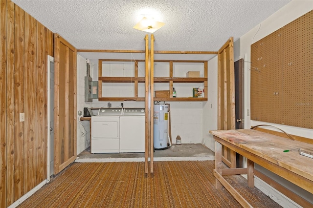 interior space with a workshop area, electric water heater, wooden walls, and a textured ceiling