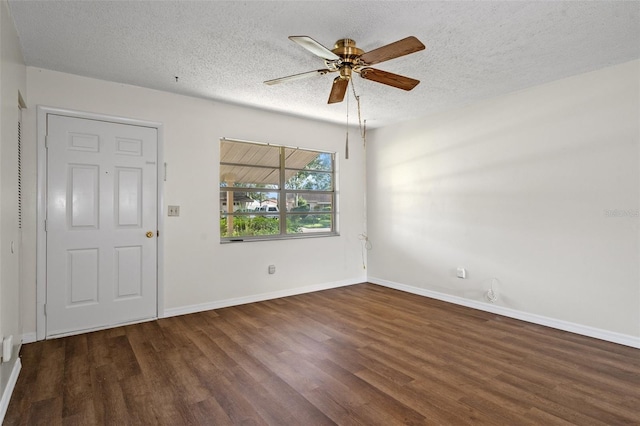 unfurnished room with a textured ceiling, ceiling fan, and dark hardwood / wood-style floors