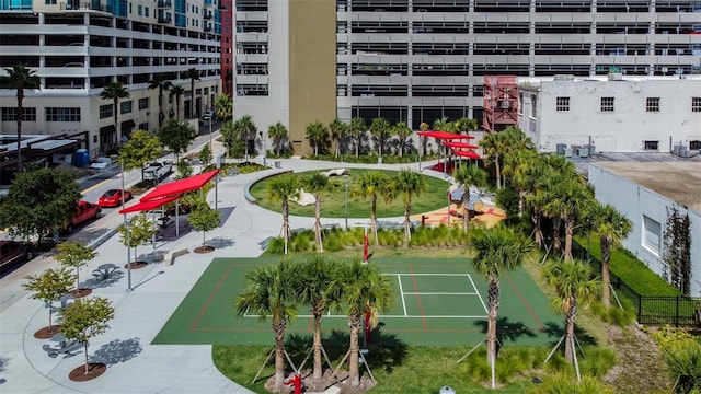 surrounding community with tennis court