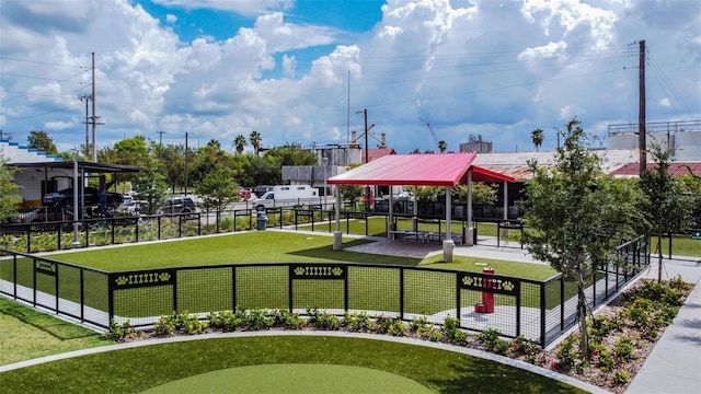 view of property's community featuring a lawn