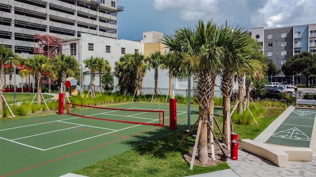 surrounding community with tennis court