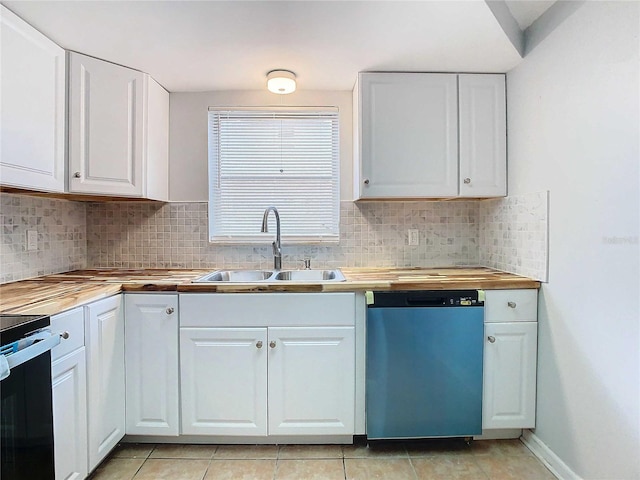 kitchen with backsplash, white cabinetry, stainless steel dishwasher, and butcher block countertops