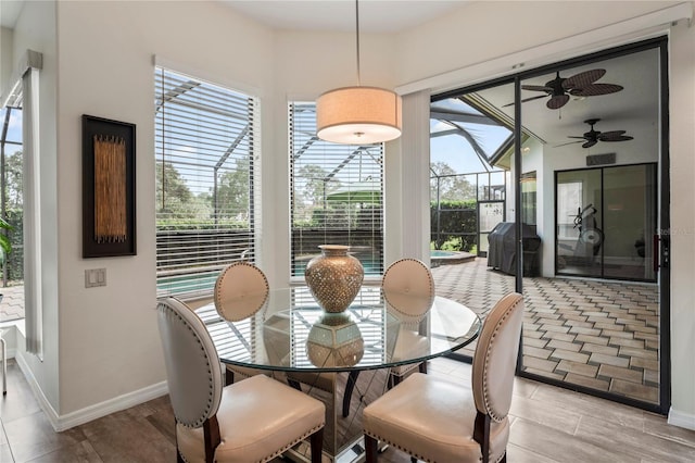 dining space featuring ceiling fan