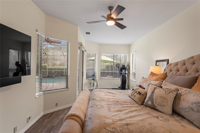 bedroom featuring ceiling fan and hardwood / wood-style floors