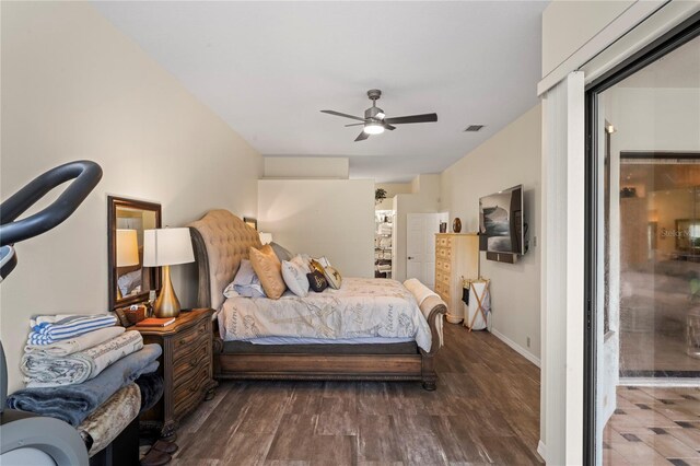 bedroom featuring ceiling fan and wood-type flooring