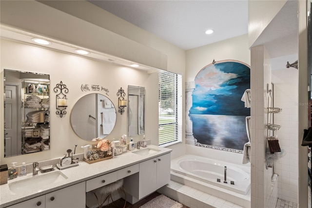 bathroom featuring plus walk in shower and vanity