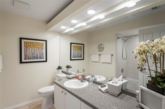 full bathroom featuring tiled shower / bath combo, tile patterned floors, toilet, and vanity