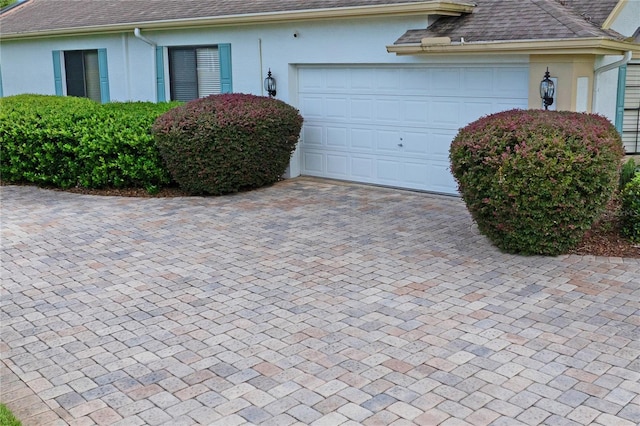 exterior space with a garage