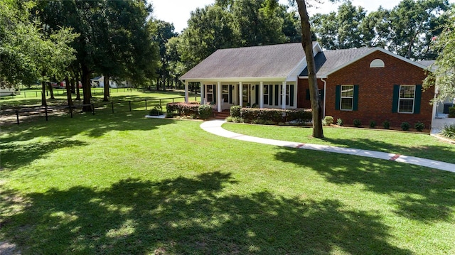 view of front of home featuring a front yard