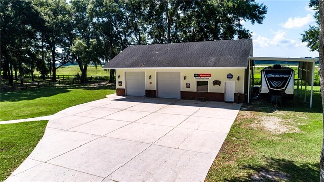 view of front of property featuring a front lawn and a carport