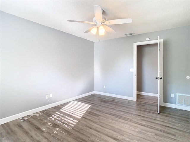 unfurnished bedroom featuring hardwood / wood-style floors and ceiling fan