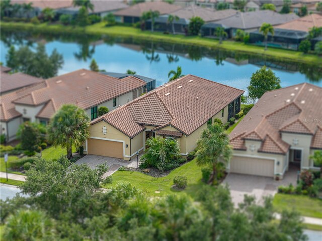 aerial view featuring a water view