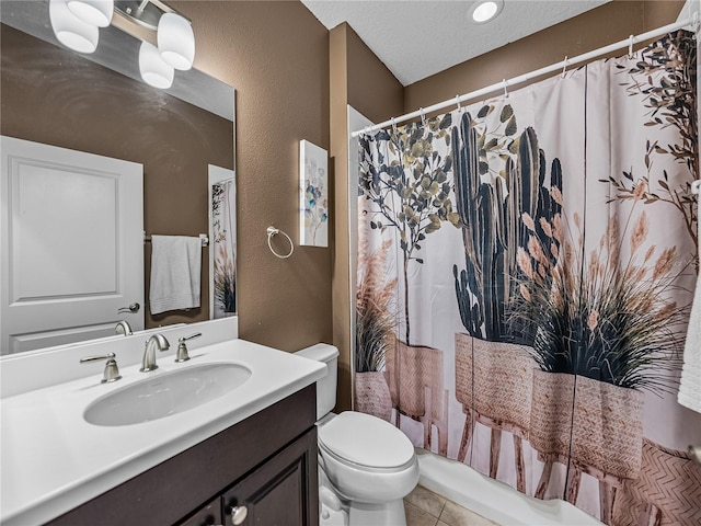 full bathroom featuring tile patterned floors, shower / bath combo, toilet, and vanity