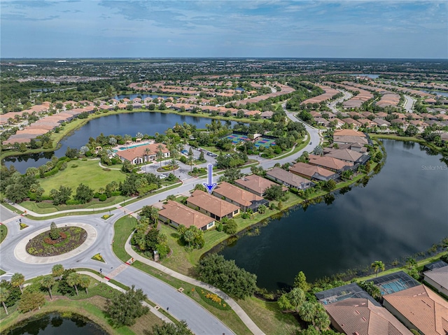 drone / aerial view featuring a water view